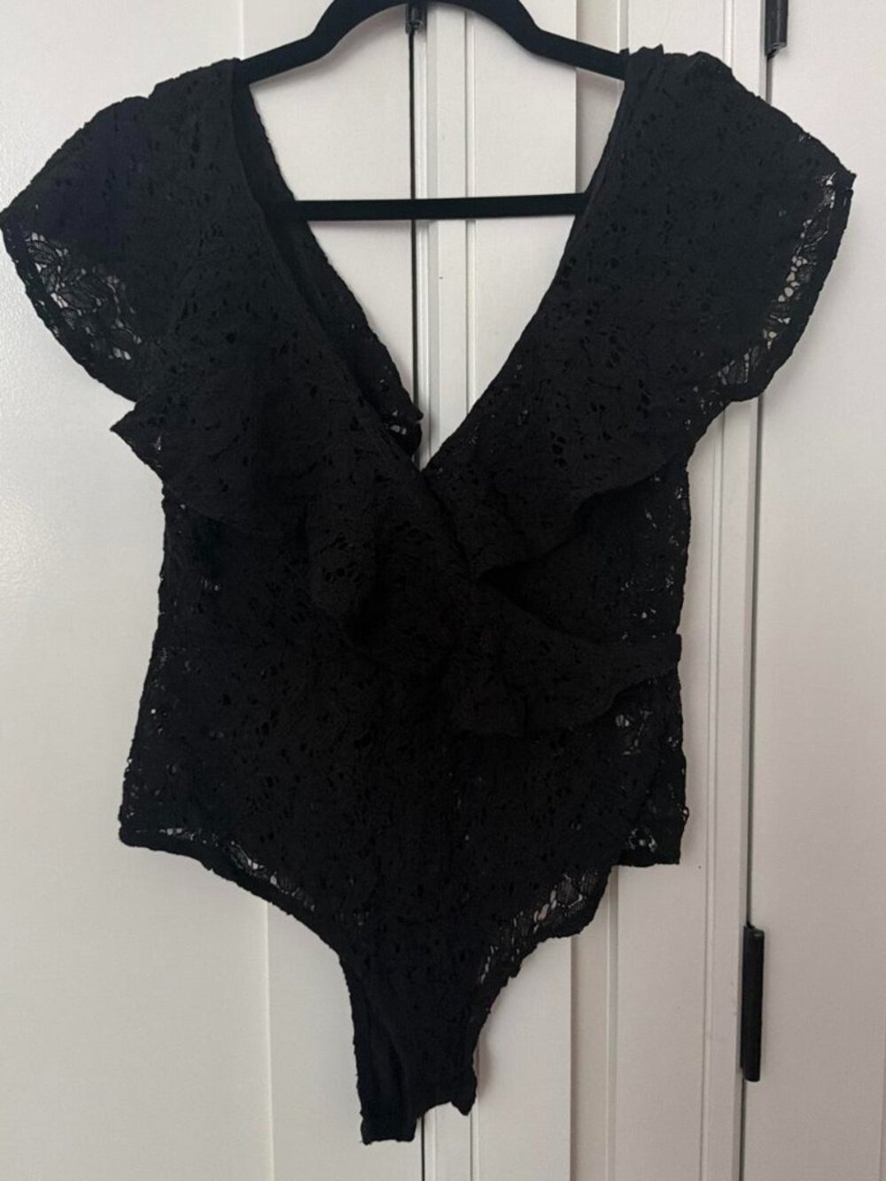 Black lace bodysuit with ruffles
